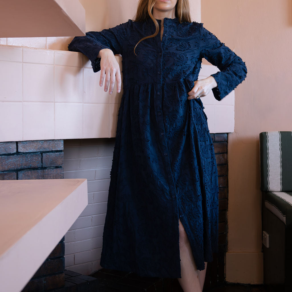 Ellka Dress, a navy embroidered cotton midi dress by Sorority Clothing