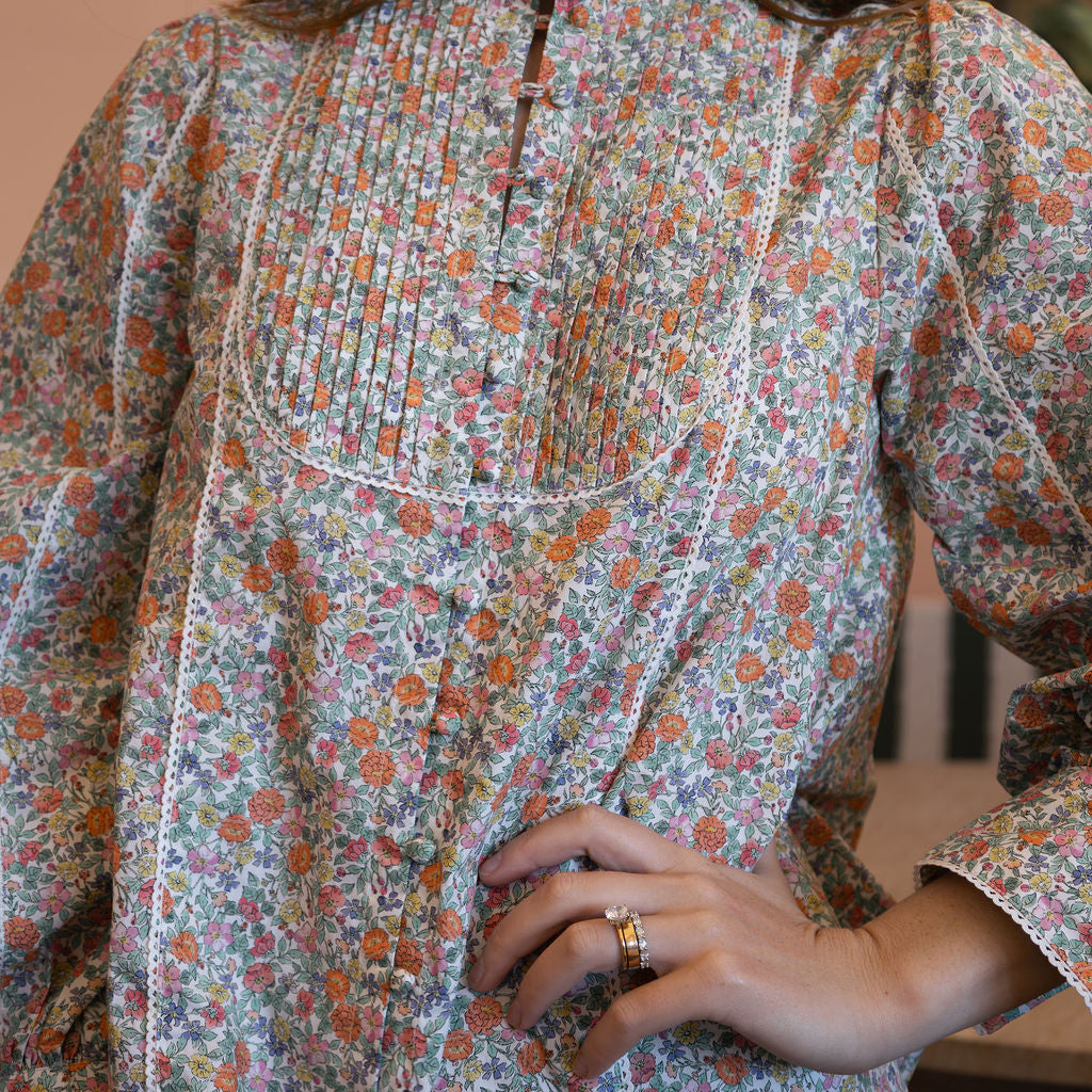 3 Ways to Style a Printed Top Under a Sweatshirt This Autumn