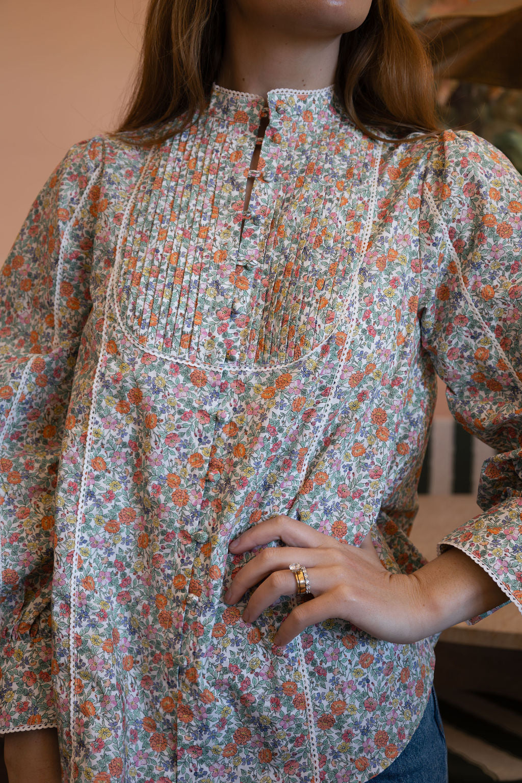 3 Ways to Style a Printed Top Under a Sweatshirt This Autumn
