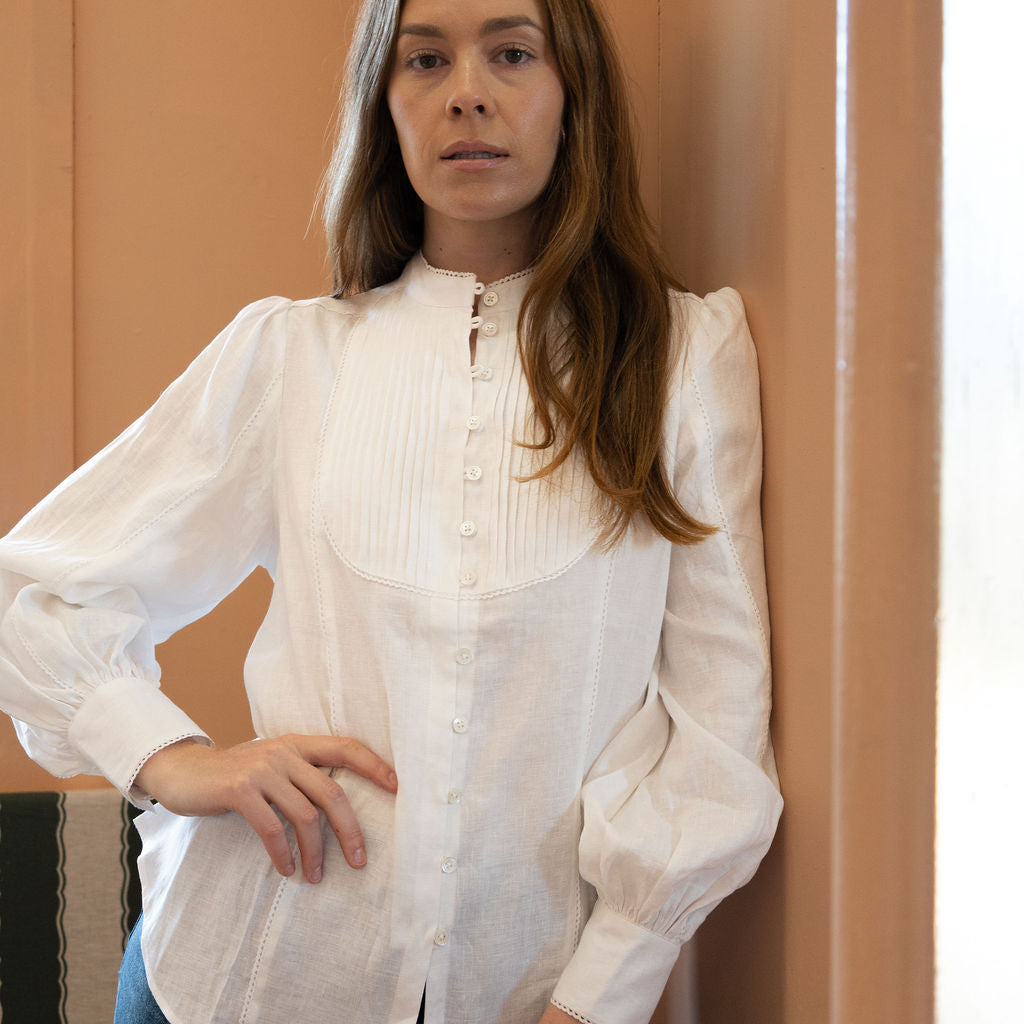 Ada white linen shirt with pleated bib front and lace trim detail