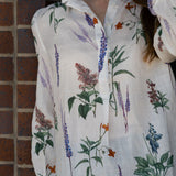 Blusa de algodón con cuello con volantes y lino con estampado floral