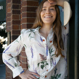 Blusa de algodón con cuello con volantes y lino con estampado floral