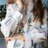 Blusa de algodón con cuello con volantes y lino con estampado floral