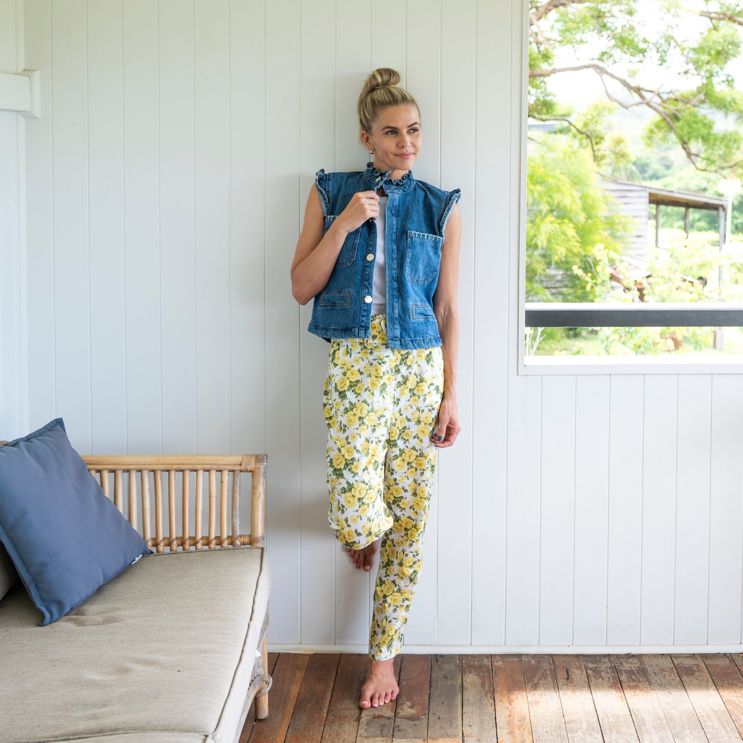 Floral pants paired with cotton denim blue vest and a white singlet