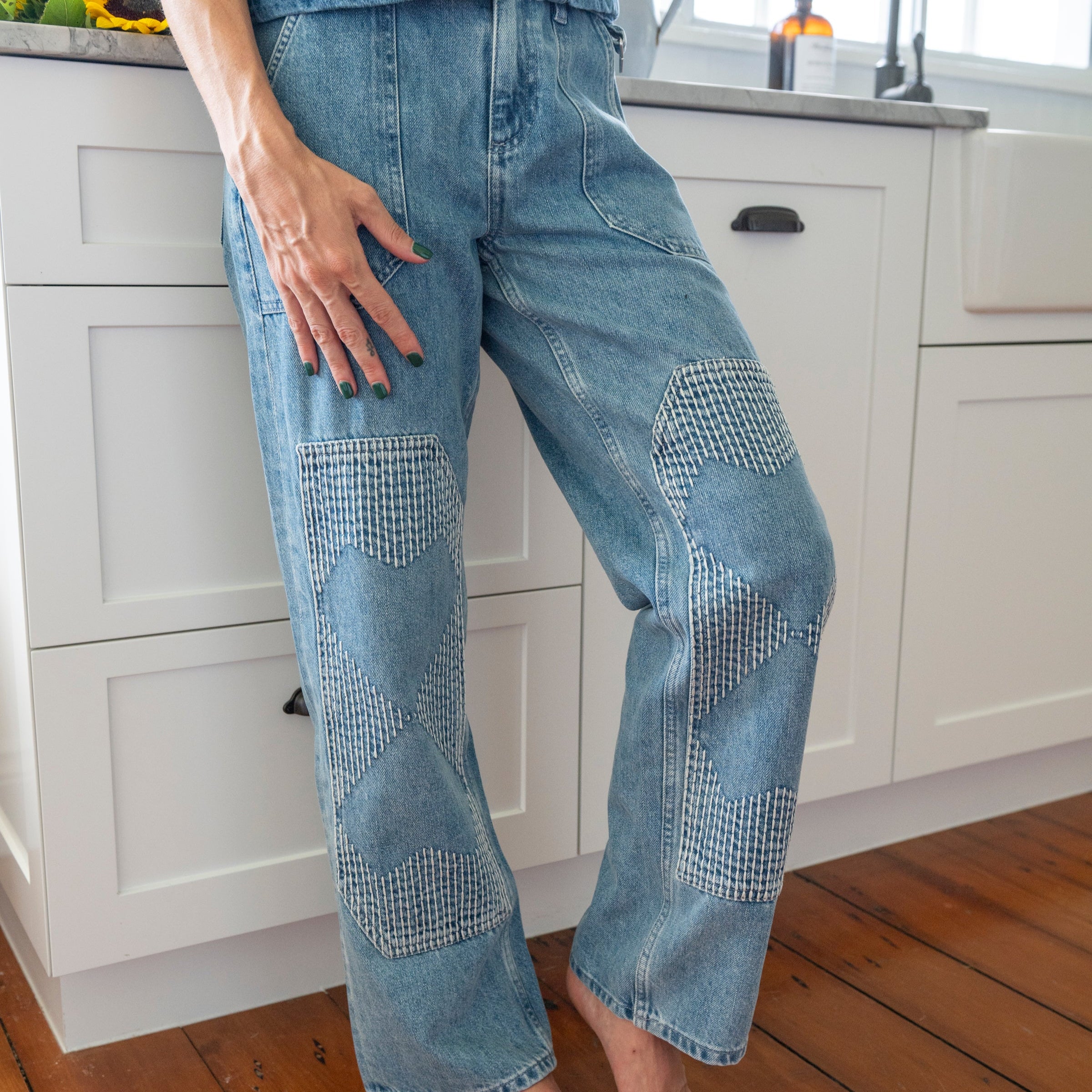 Patchwork detail denim straight leg jeans with large pockets 