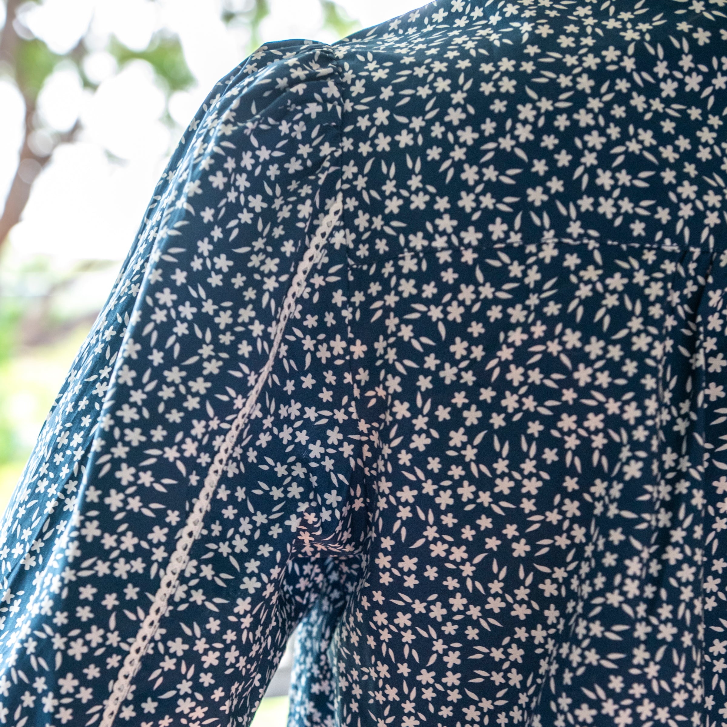 Close up of navy floral cotton shirt 