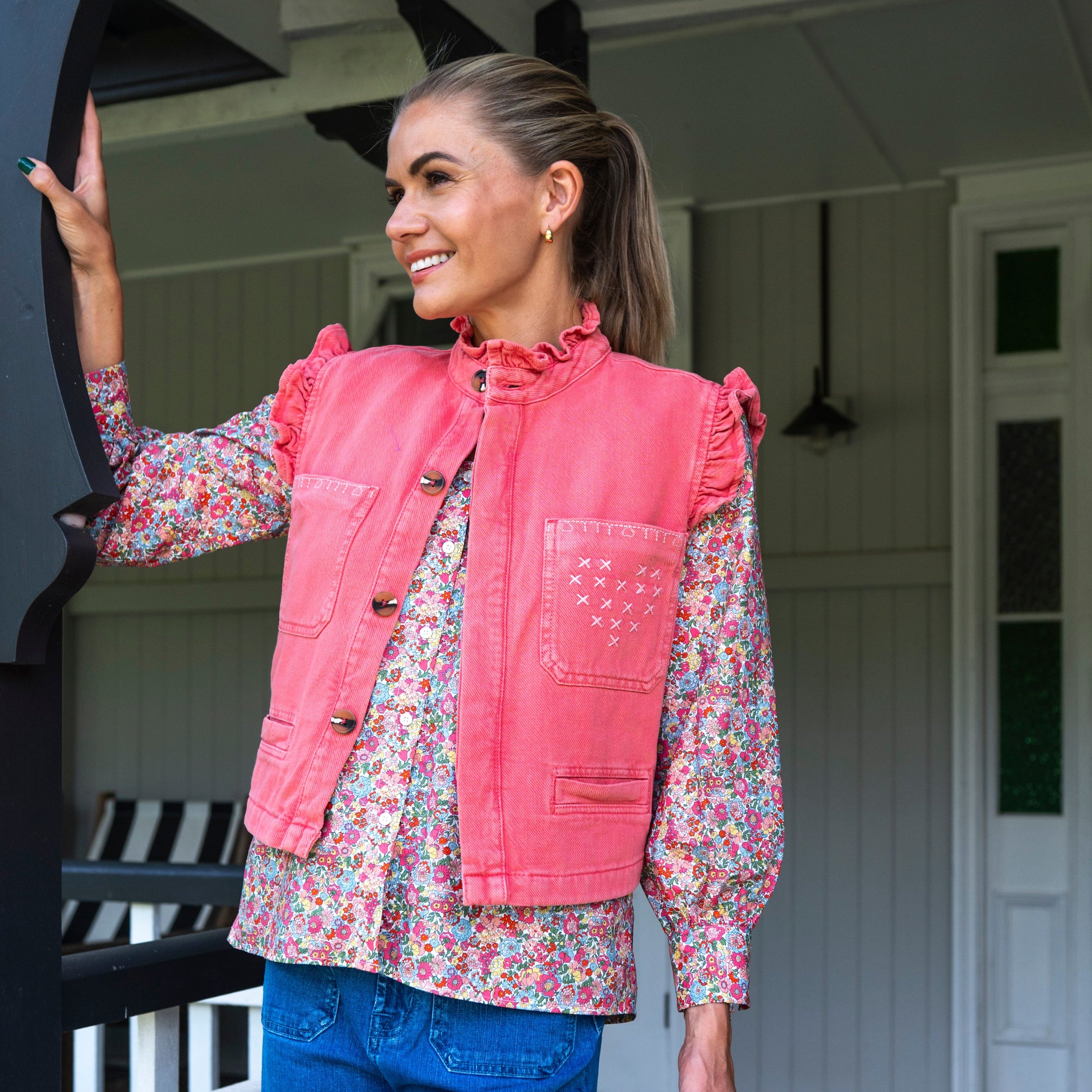 Red Denim Vest with frill Collar and layered with floral peter pan liberty fabrics cotton blouse