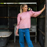 Pink Cotton Top with Puff Sleeves worn with jeans  and made of Liberty fabrics retro print tucked out