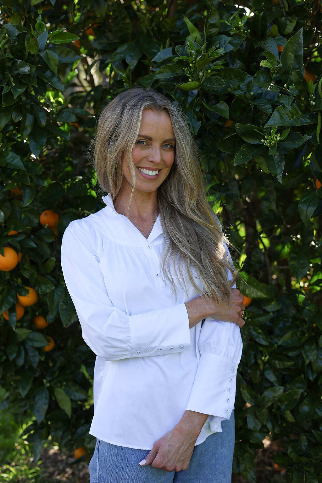 model wearing iris cotton blouse, front view