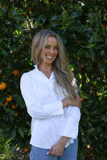 model wearing iris cotton blouse, front view