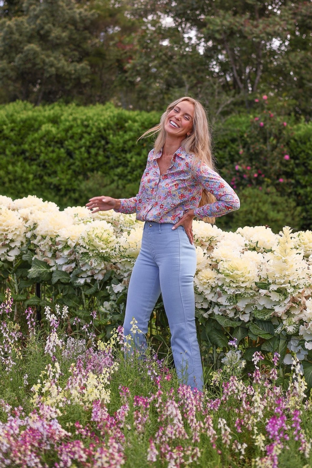 Maeve cotton shirt in Morley Hill Liberty print, distant shot, model in garden