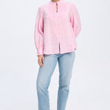 Blusa de algodón con estampado floral en azul marino y blanco y ribete blanco