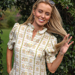 model wearing Clara linen dress, front view, close up