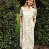 model wearing Clara linen dress, front view 