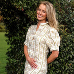 model wearing Clara linen dress, side three quareter view, close up