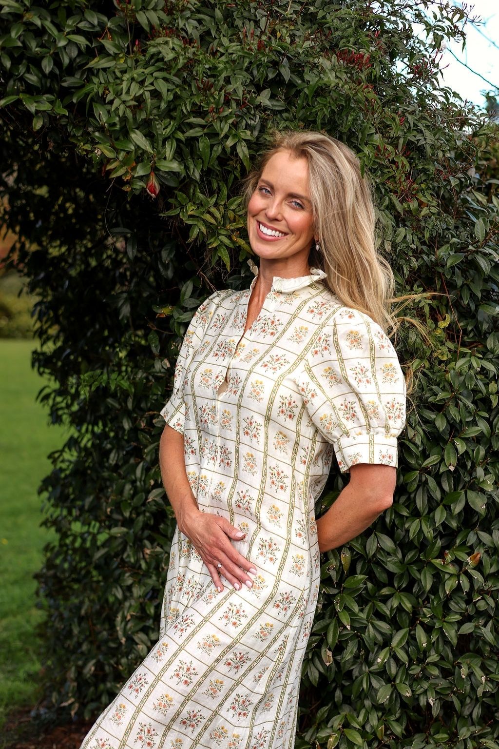model wearing Clara linen dress, side three quareter view, close up