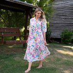 Cotton dress in pink floral print with a collar in a floral design