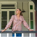 Chelsea Collared Liberty Fabrics Floral Blouse with full buttons paired with jeans