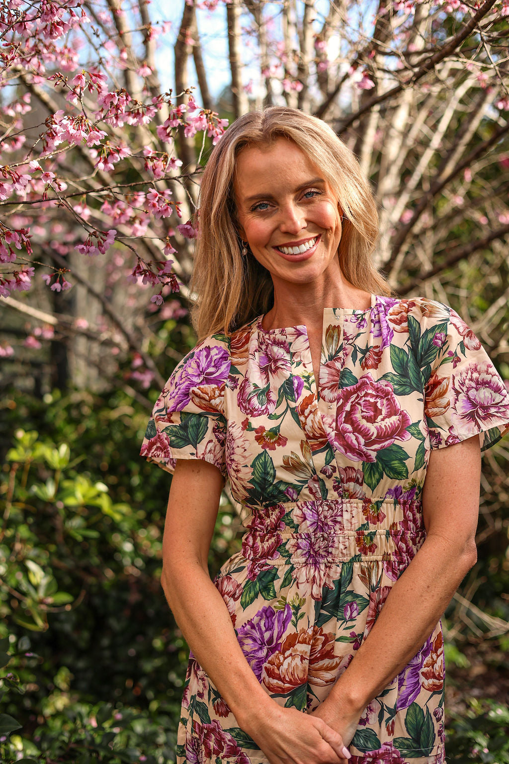 model wearing Georgina cotton maxi dress in pink floral print, up close front view