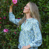 model wearing Valerie cotton shirt in Vigers Vine Liberty print, left side view